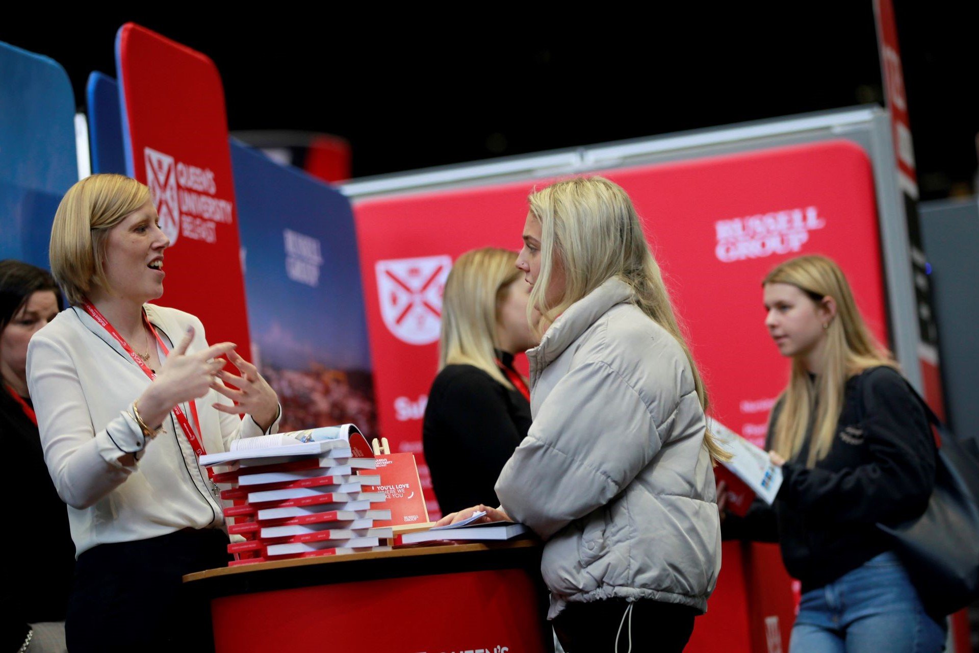 students and staff at UCAS exhibition