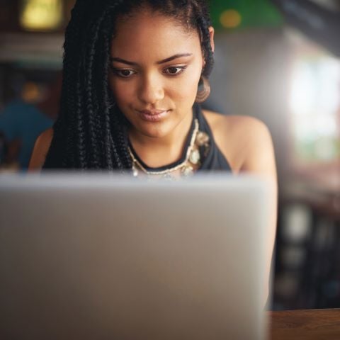 Student using UCAS CV Builder on laptop