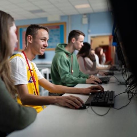 Students in classroom using computers