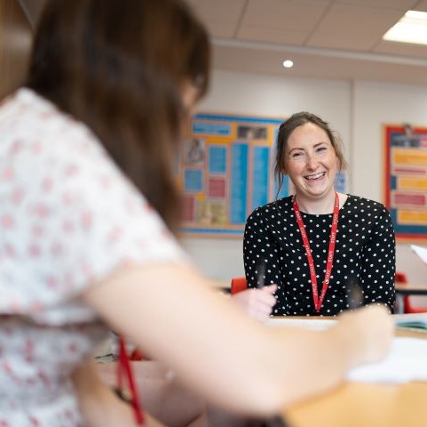 Adviser talking to a student