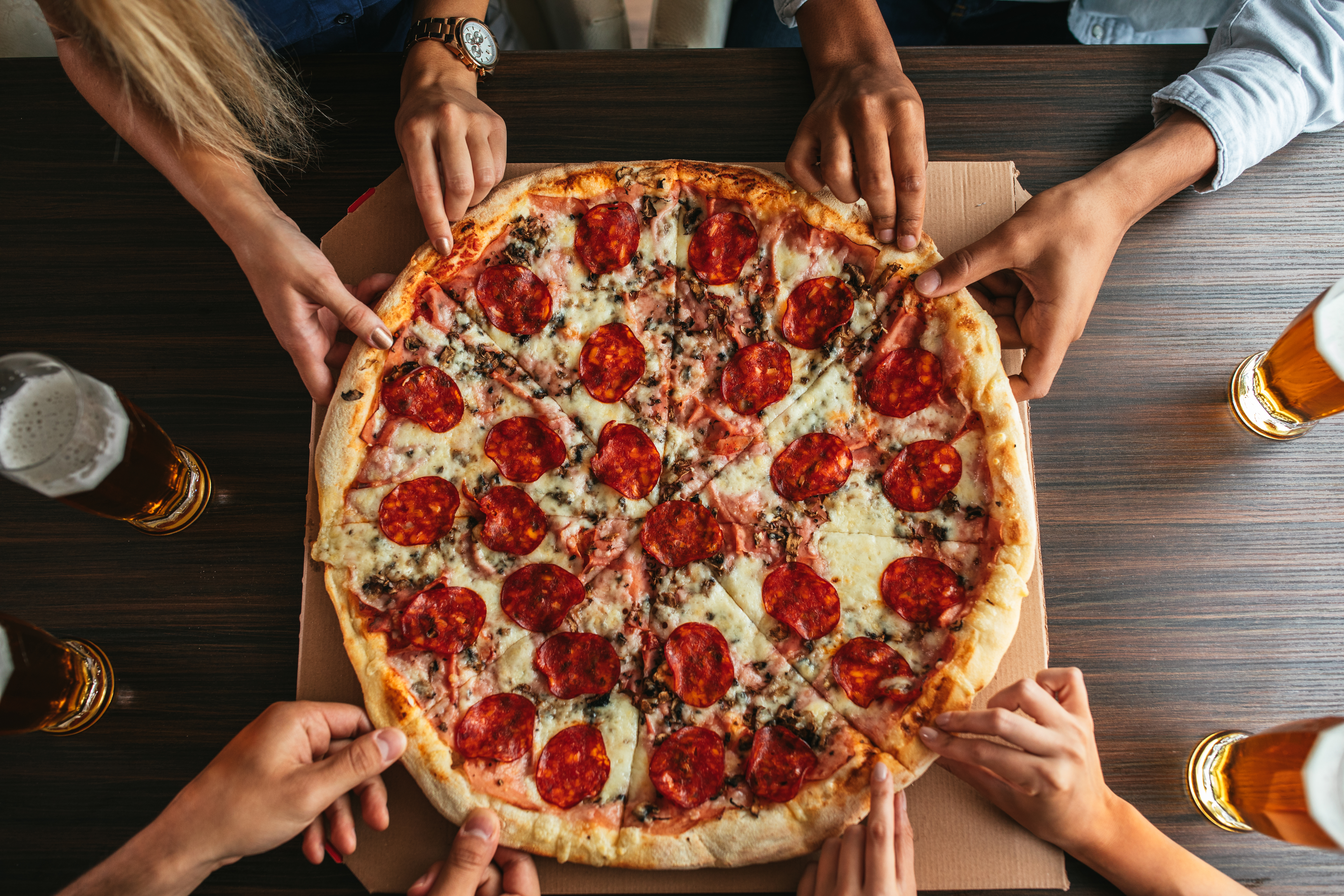 People eating pizza