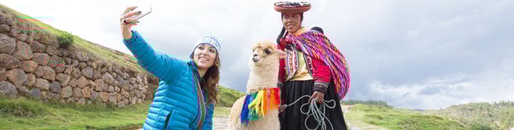 Gap year student taking a selfie with a llama