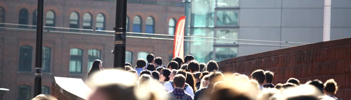 Students walking at an open day 
