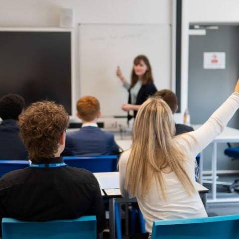 Students in a classroom with teacher
