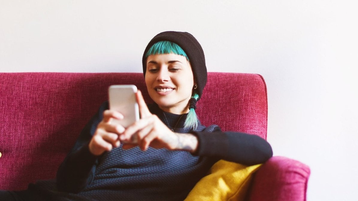 Student signing in student_on_sofa_signing_in