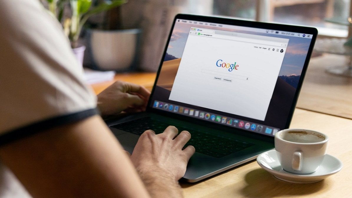 Student on laptop searching online