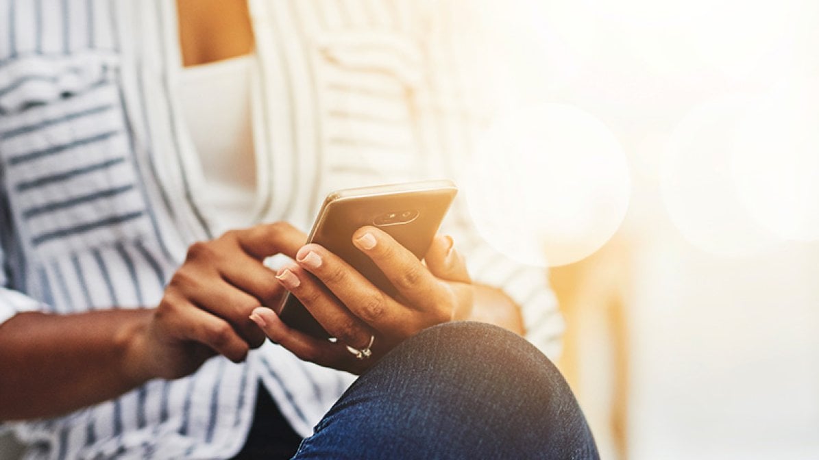 Woman using her phone to make a call