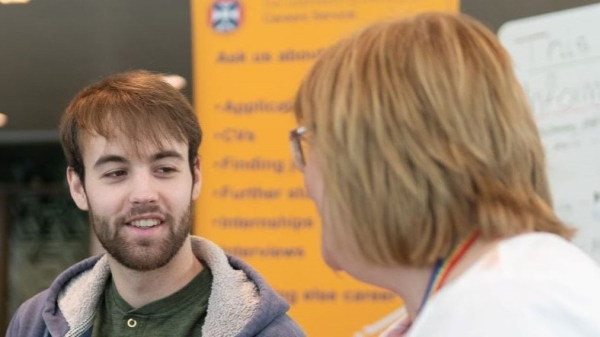 Student speaking to uni disability adviser