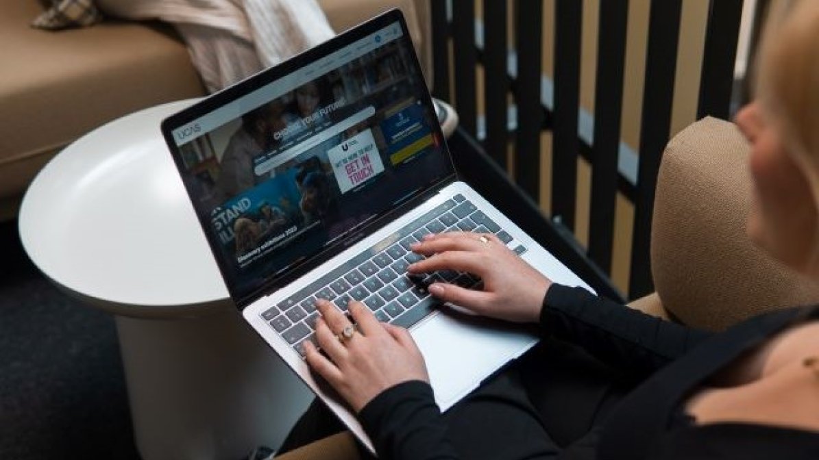 Student making a UCAS application on laptop