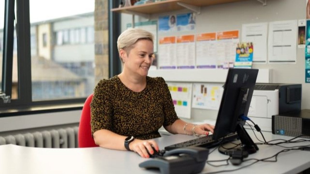 Adviser watching UCAS report training videos