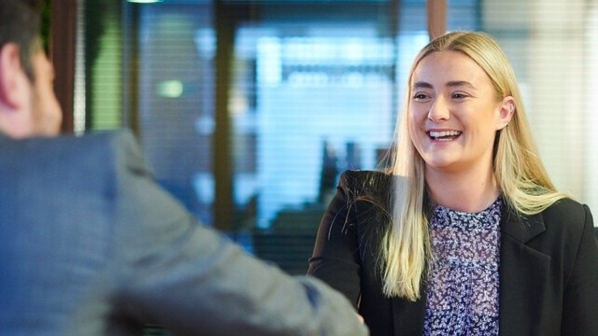 Apprentice shaking interviewer's hand