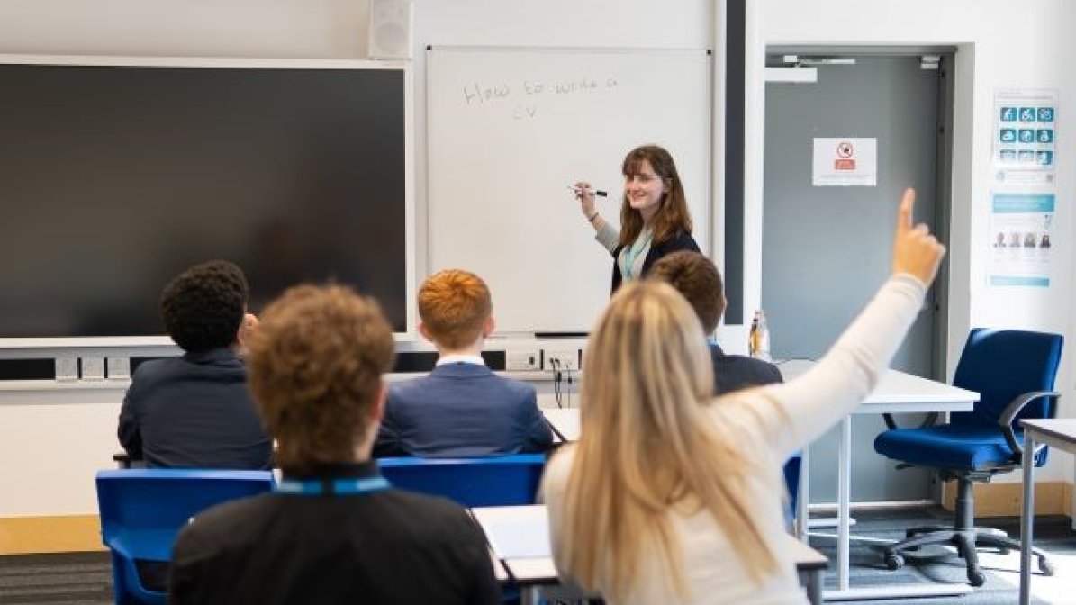 Pupils and teacher in classroom