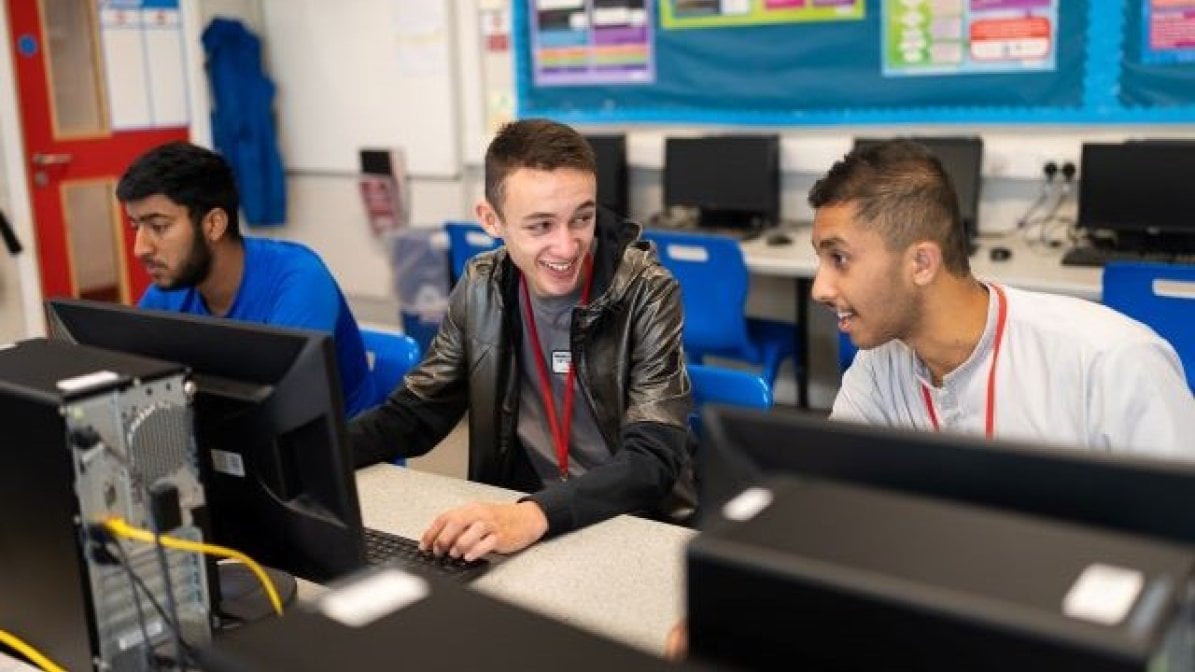 Students using computers in a classroom 