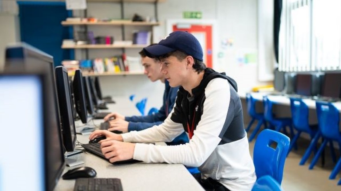 Students using computers in classroom