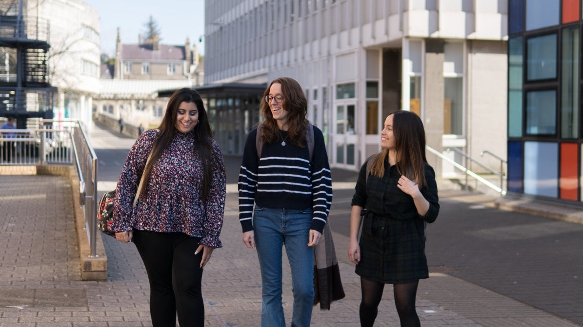 students walking on campus