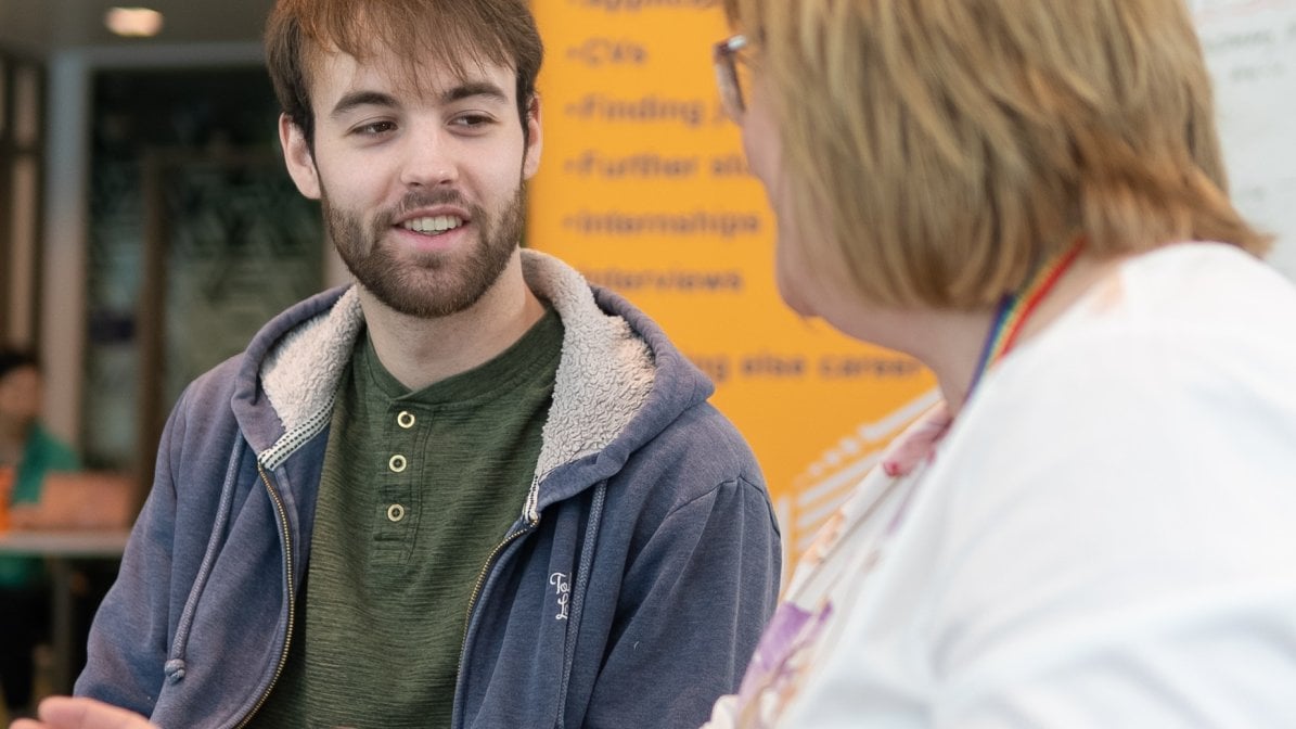 Adviser with student