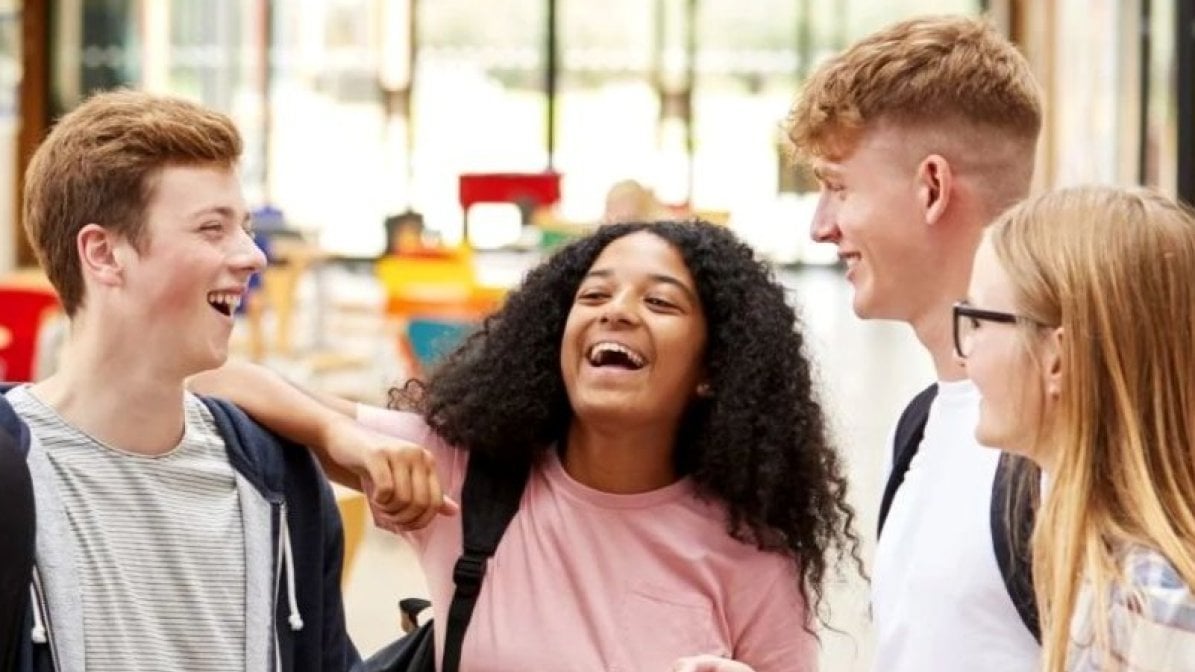 Students collecting exam results in school