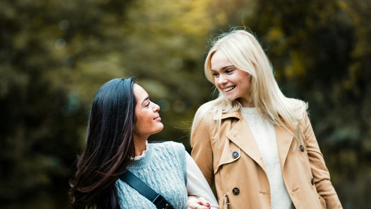 Students walking in a park 