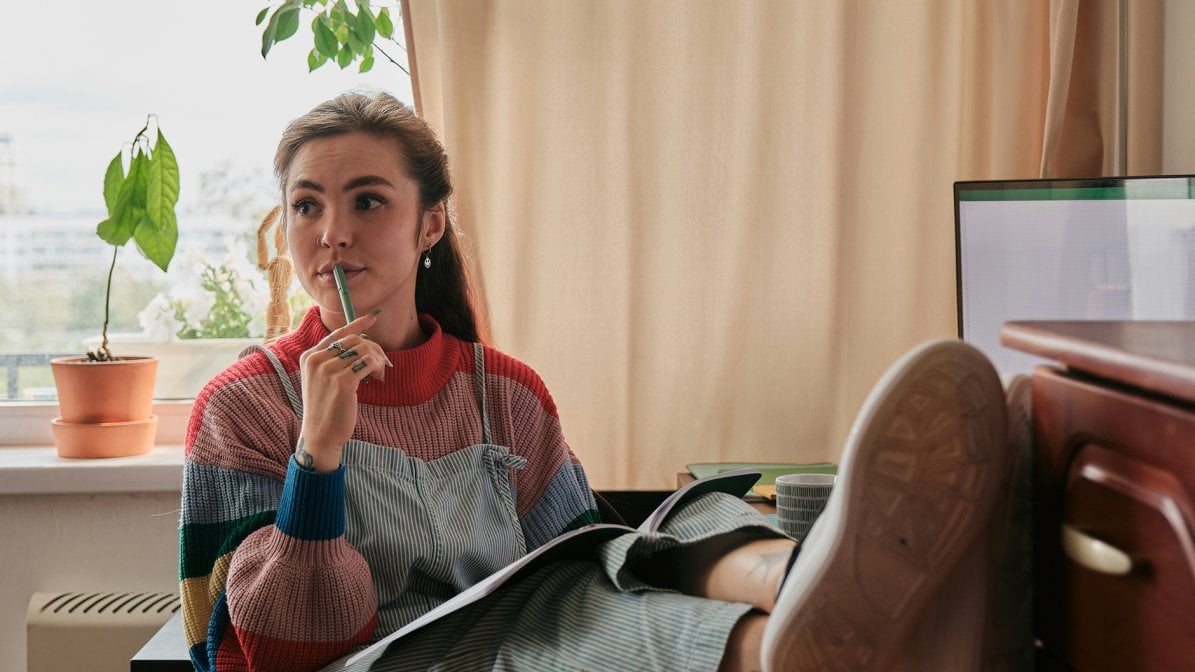 Student studying at home desk