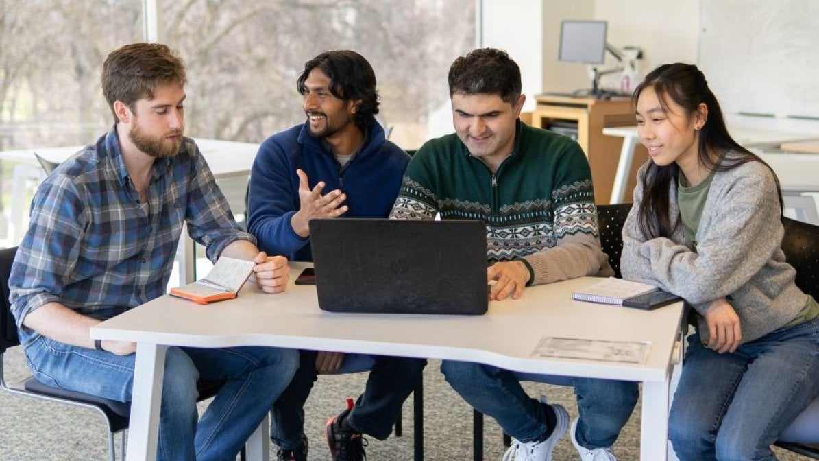 Students chatting in communal area at university