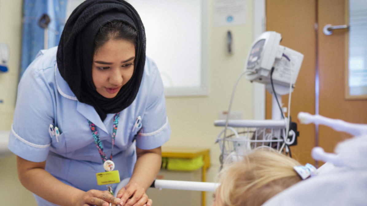nurse hero banner nurse looking after a patient