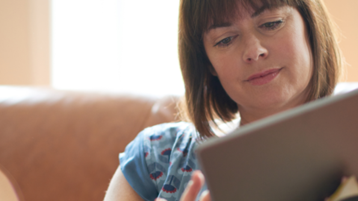 Woman looking at a tablet