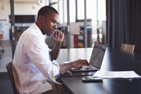 Adviser writing a UCAS undergraduate reference