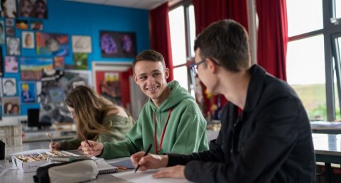 Students at desks in classroom