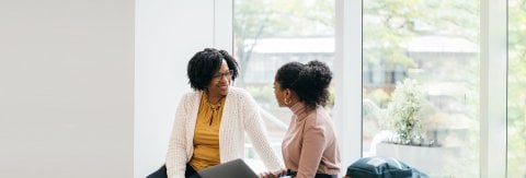 Adviser speaking to student