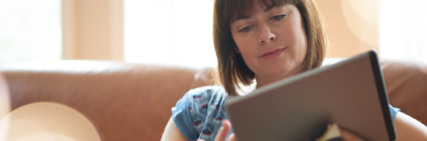 Woman looking at a tablet