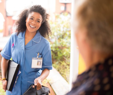 Trainee nurse at patient's home