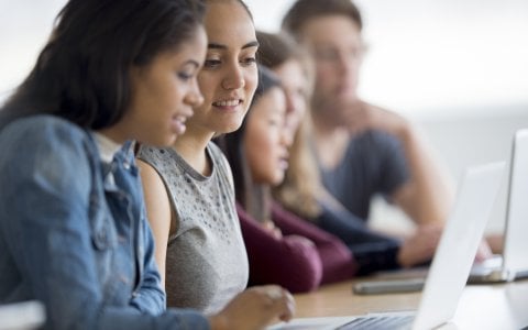 students on laptop