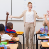 Teacher in classroom with pupils