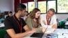 Adviser chatting with students